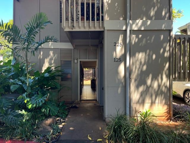 4435 Lower Honoapiilani Road, Unit 225 Lahaina, HI 96761 - Photo 3 of 35 a front view of a house with a yard