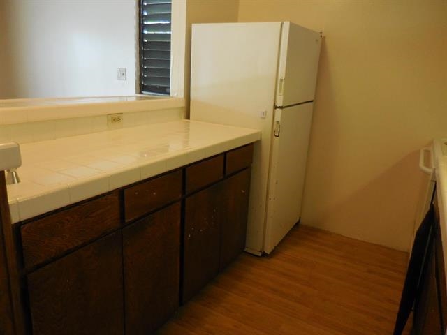4435 Lower Honoapiilani Road, Unit 225 Lahaina, HI 96761 - Photo 35 of 35 a bathroom with a sink and a mirror