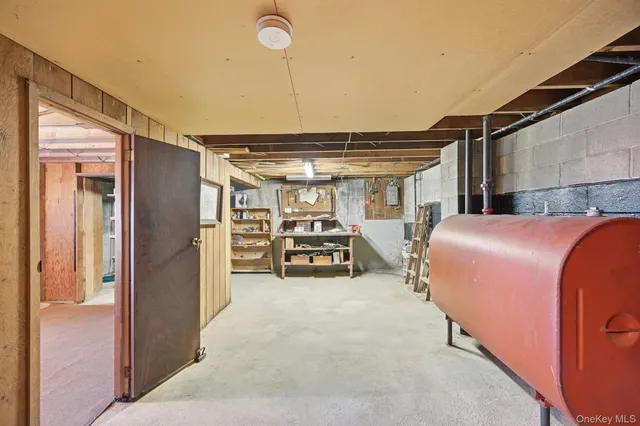 a view of a yard with fountain in front of a house