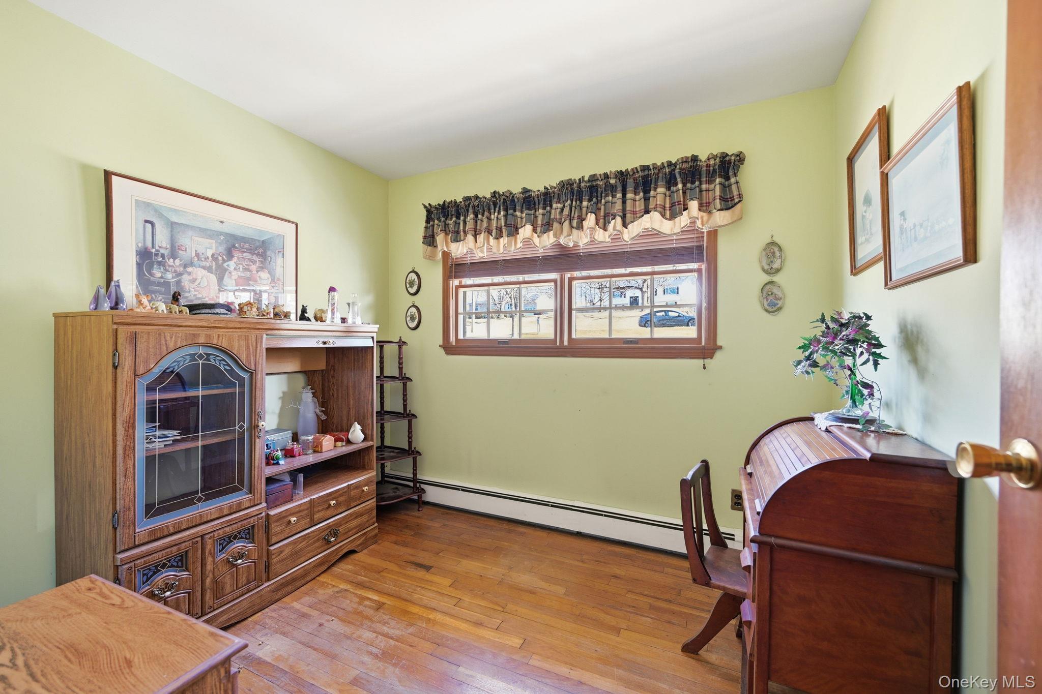 50 Everett Road Carmel, NY 10512 - Photo 8 of 23 a living room with furniture and a flat screen tv
