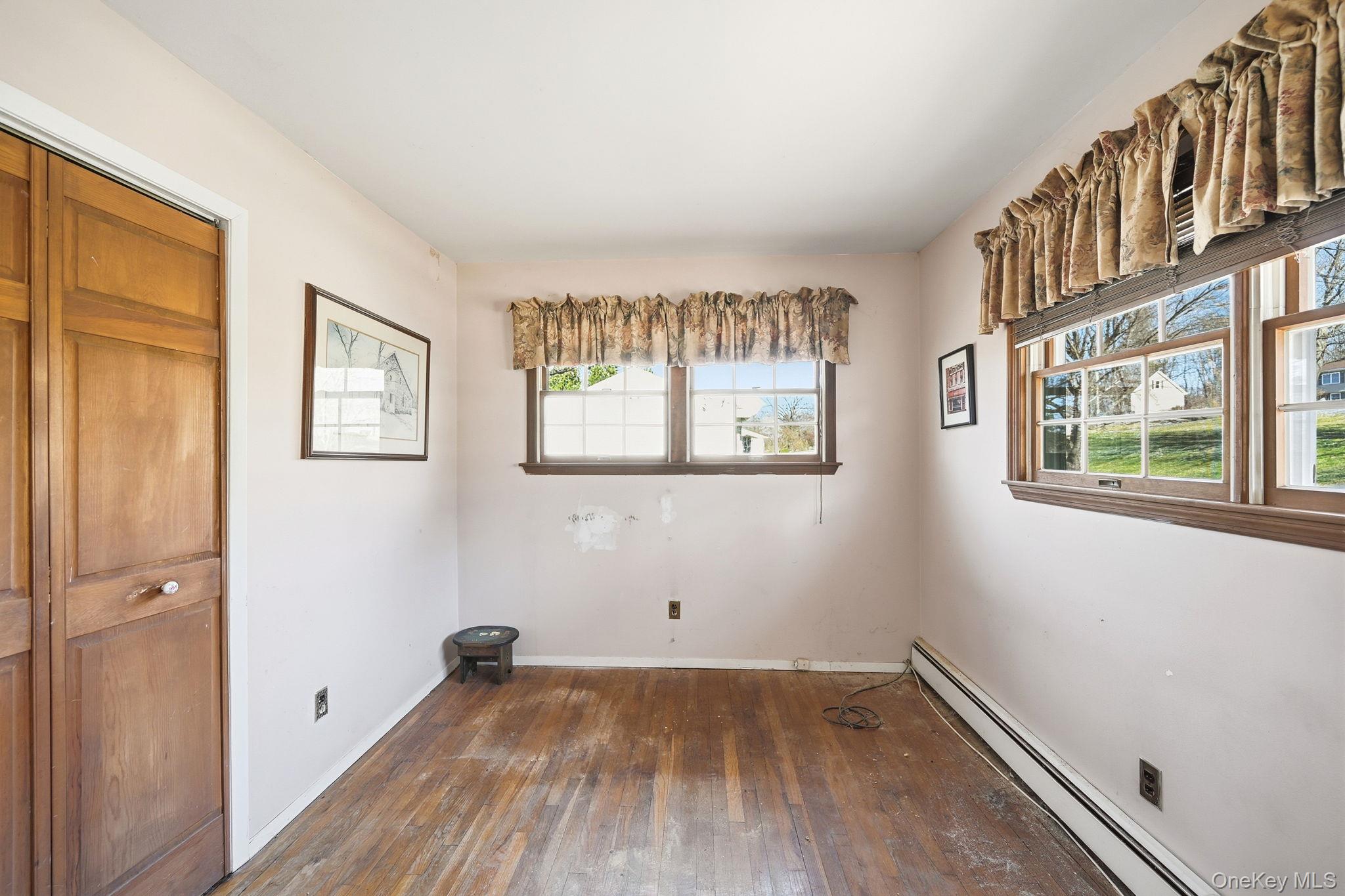 50 Everett Road Carmel, NY 10512 - Photo 9 of 23 a view of a room with wooden floor and windows