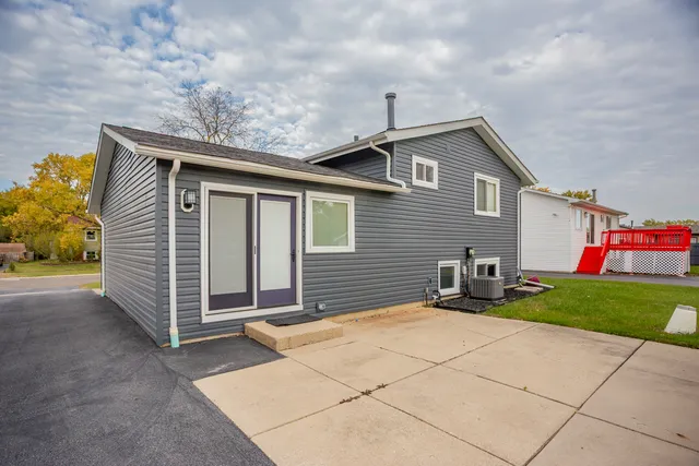 a front view of a house with garage
