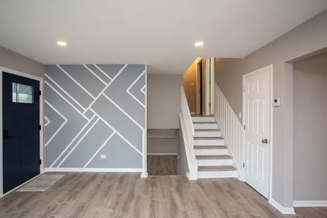 a view of a livingroom with a staircase