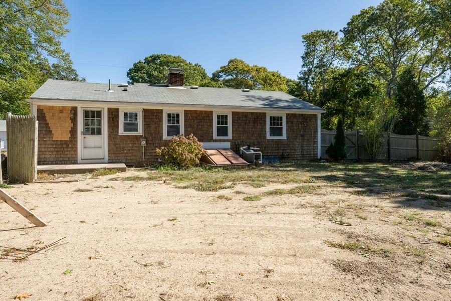 343 Strawberry Hill Road Centerville, MA 02632 - Photo 15 of 15 a view of a house with backyard