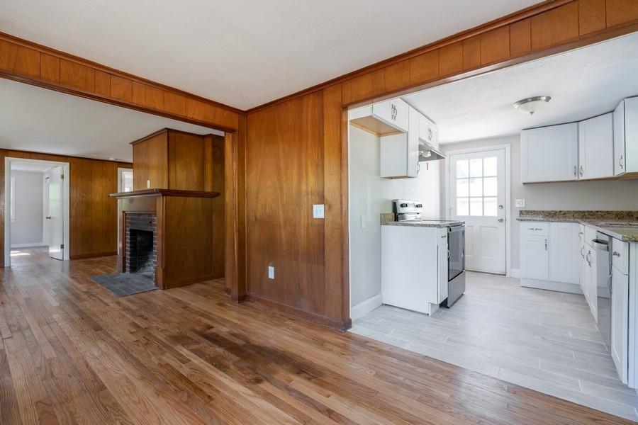 343 Strawberry Hill Road Centerville, MA 02632 - Photo 5 of 15 a view of a kitchen with a sink and a refrigerator