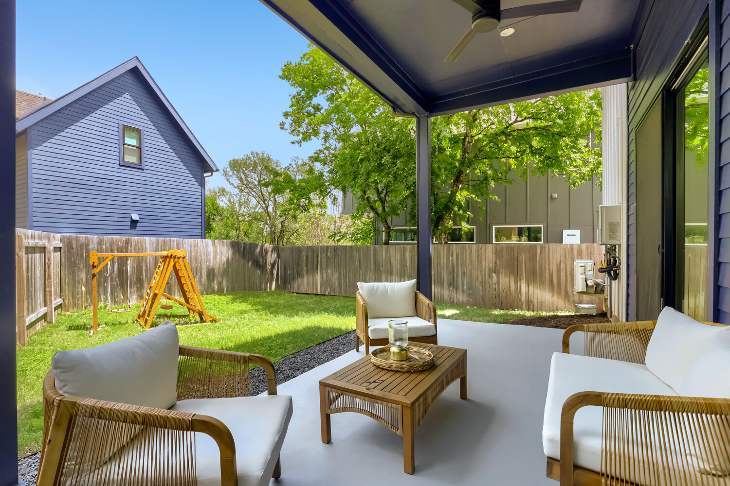 4804 Ribbecke Avenue, Unit A Austin, TX 78721 - Photo 24 of 32 The property includes a covered patio with a ceiling fan, offering an outdoor living space