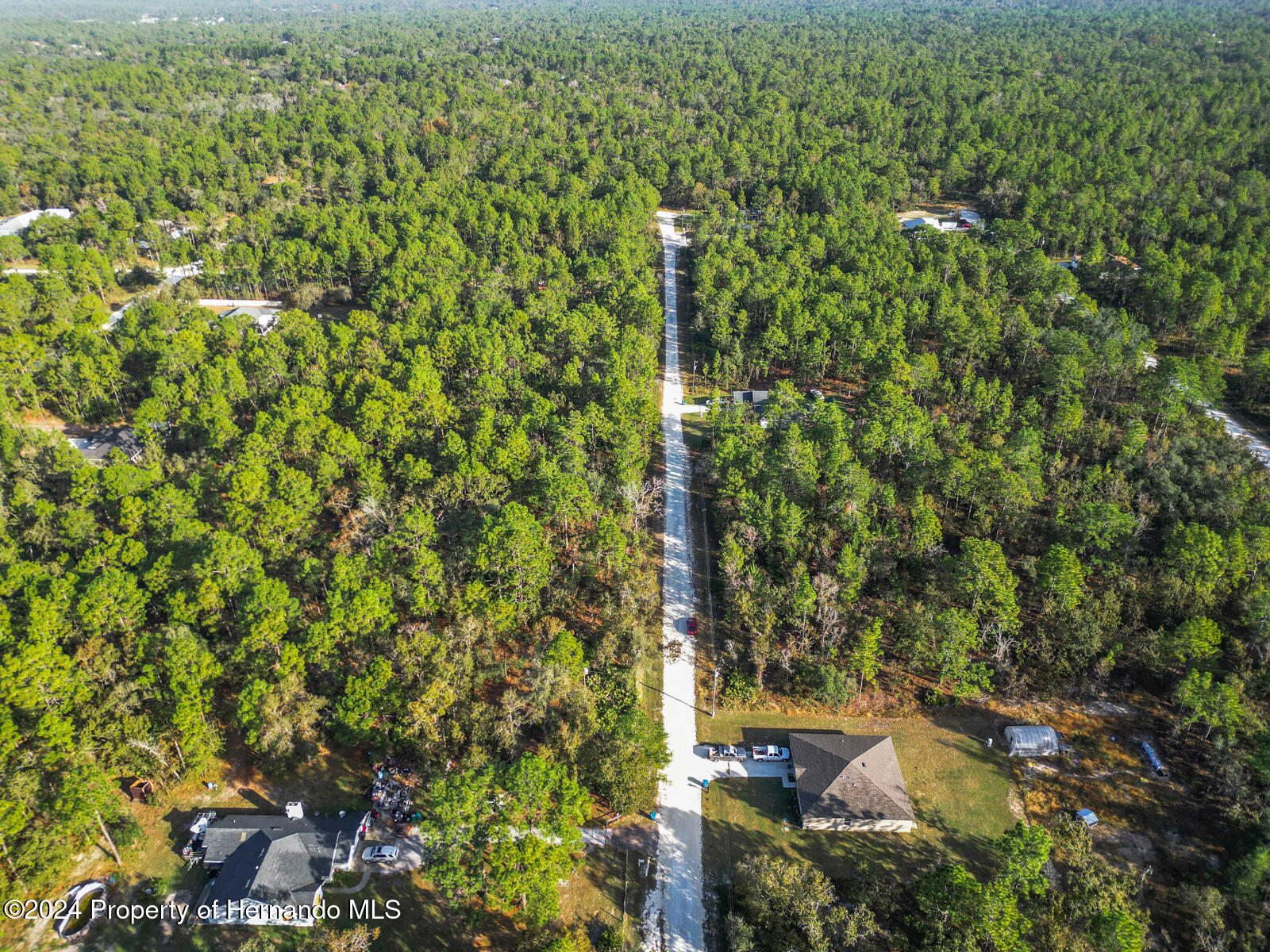 0 Macek Weeki Wachee, FL 34614 - Photo 5 of 22 an aerial view of a house with a yard