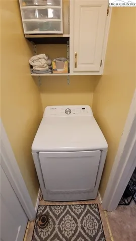a view of a balcony with chairs