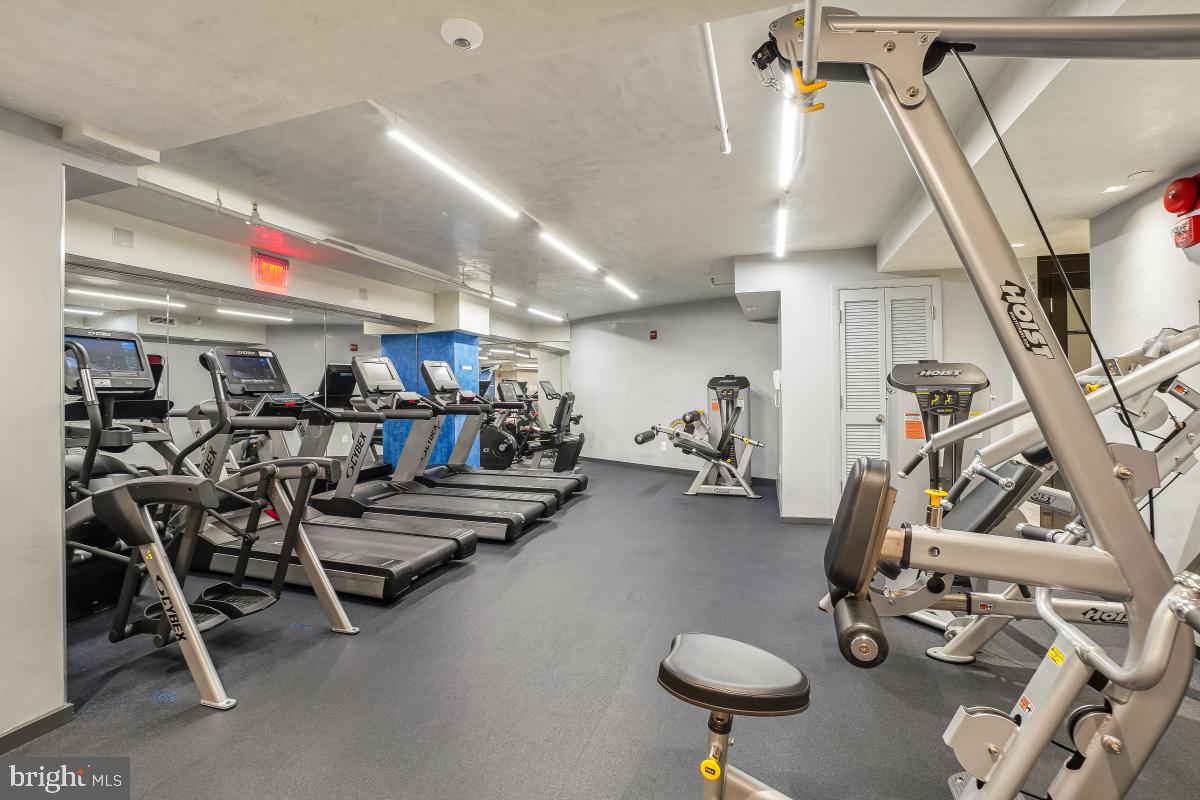 801 Pennsylvania Avenue Northwest, Unit PH06 Washington, DC 20004 - Photo 32 of 38 a view of a room with gym equipment