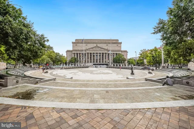a view of city with tall buildings