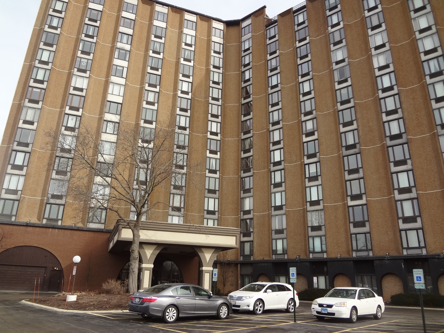 1 Renaissance Place, Unit 905 Palatine, IL 60067 - Photo 1 of 21 a car parked in front of a building
