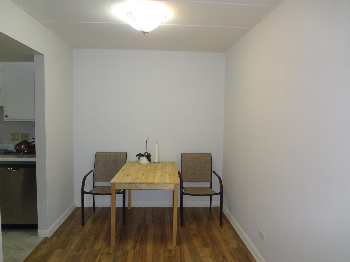 1 Renaissance Place, Unit 905 Palatine, IL 60067 - Photo 14 of 21 a chair and a table in a room