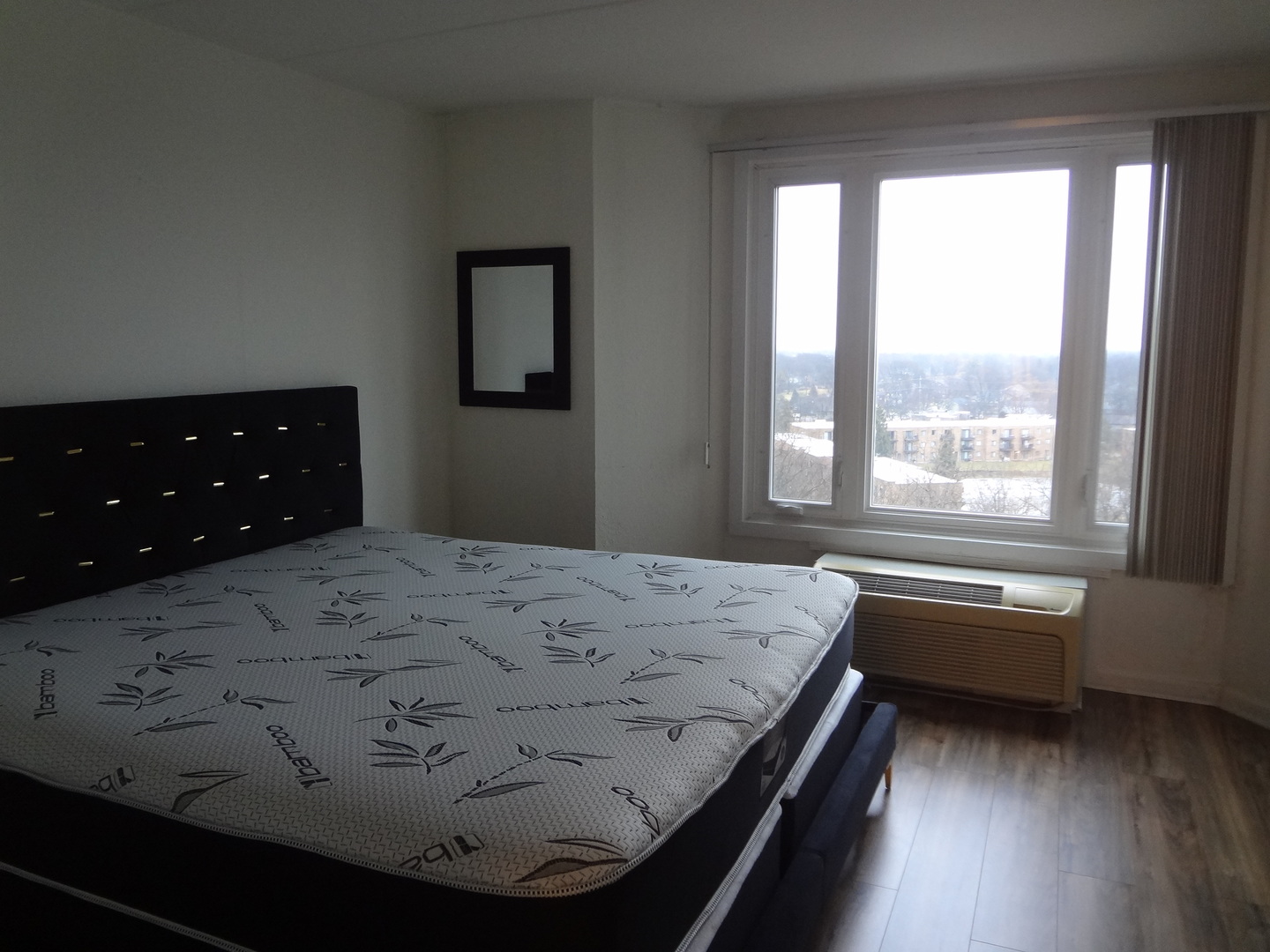 1 Renaissance Place, Unit 905 Palatine, IL 60067 - Photo 17 of 21 a bedroom with a bed and window