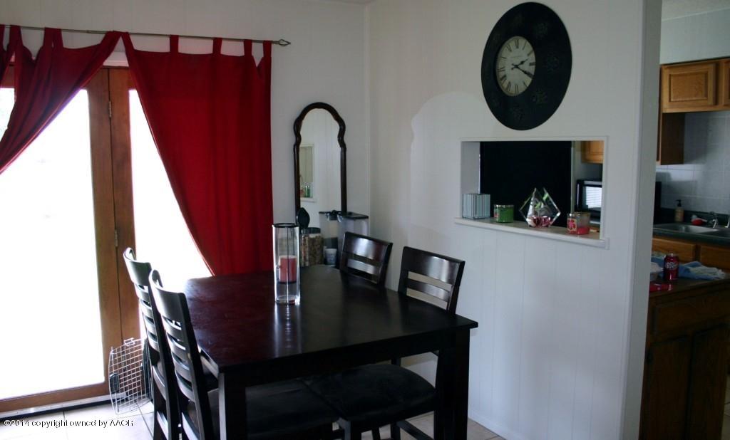 5307 Allen Street Amarillo, TX 79110 - Photo 7 of 35 a view of a dining room with furniture and entryway