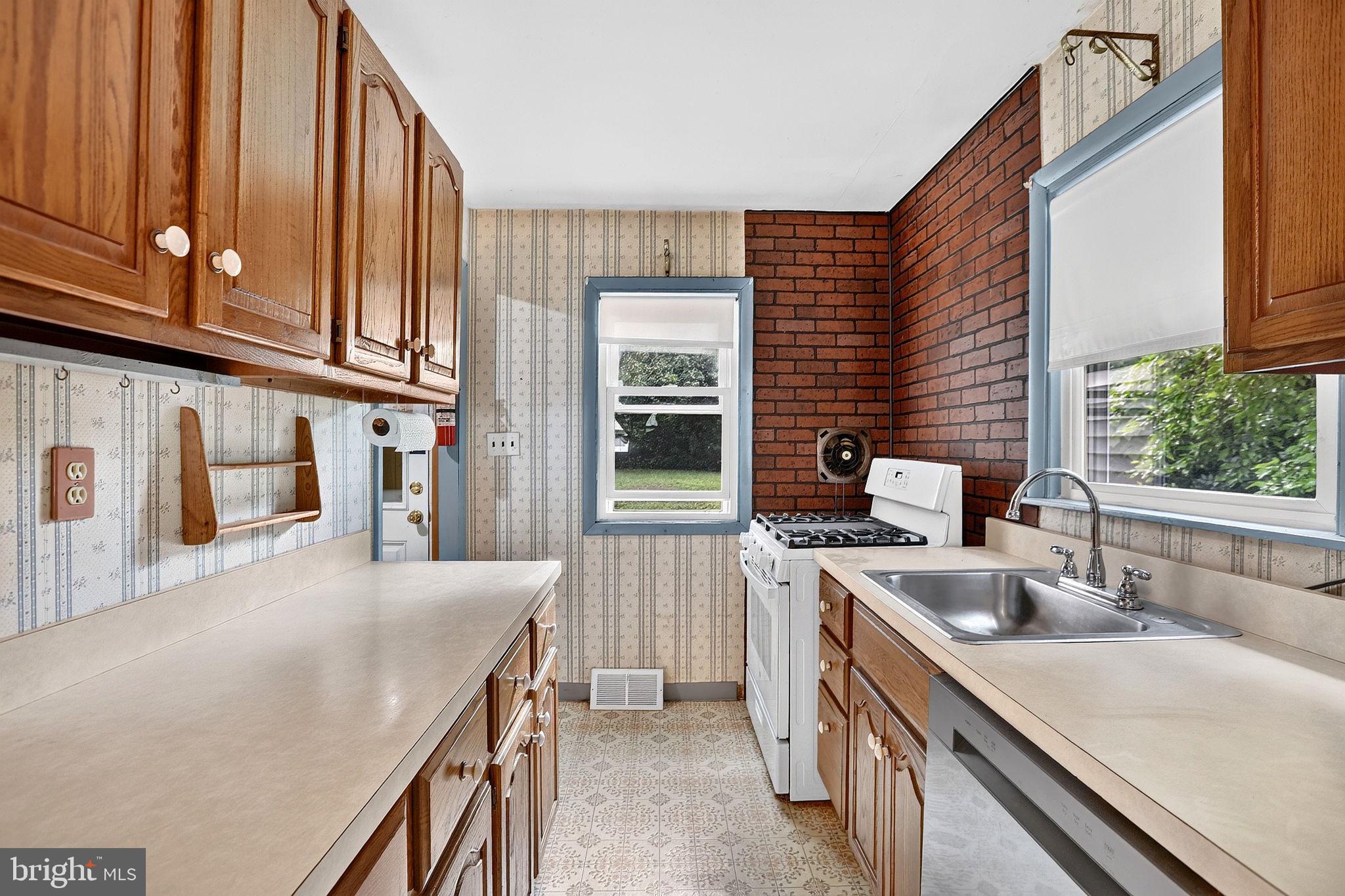 303 Wynnewood Road Ewing, NJ 08628 - Photo 6 of 21 Galley Kitchen leading to bonus room