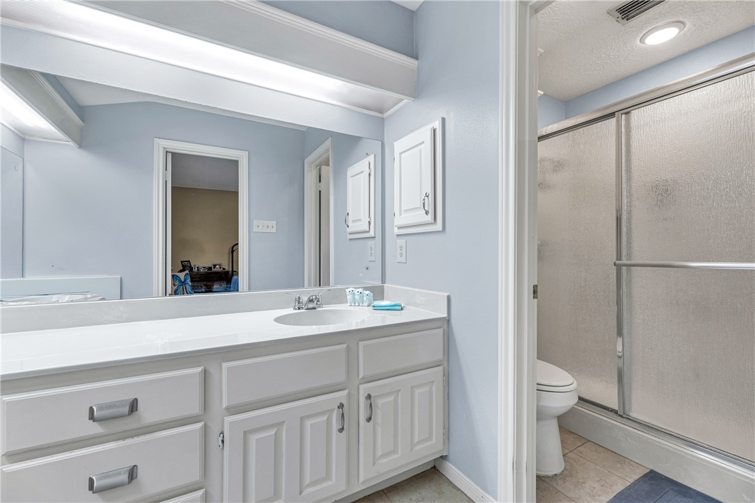 2911 Braeburn Street Bryan, TX 77802 - Photo 23 of 30 Spacious Master Bath light and bright with some updates.