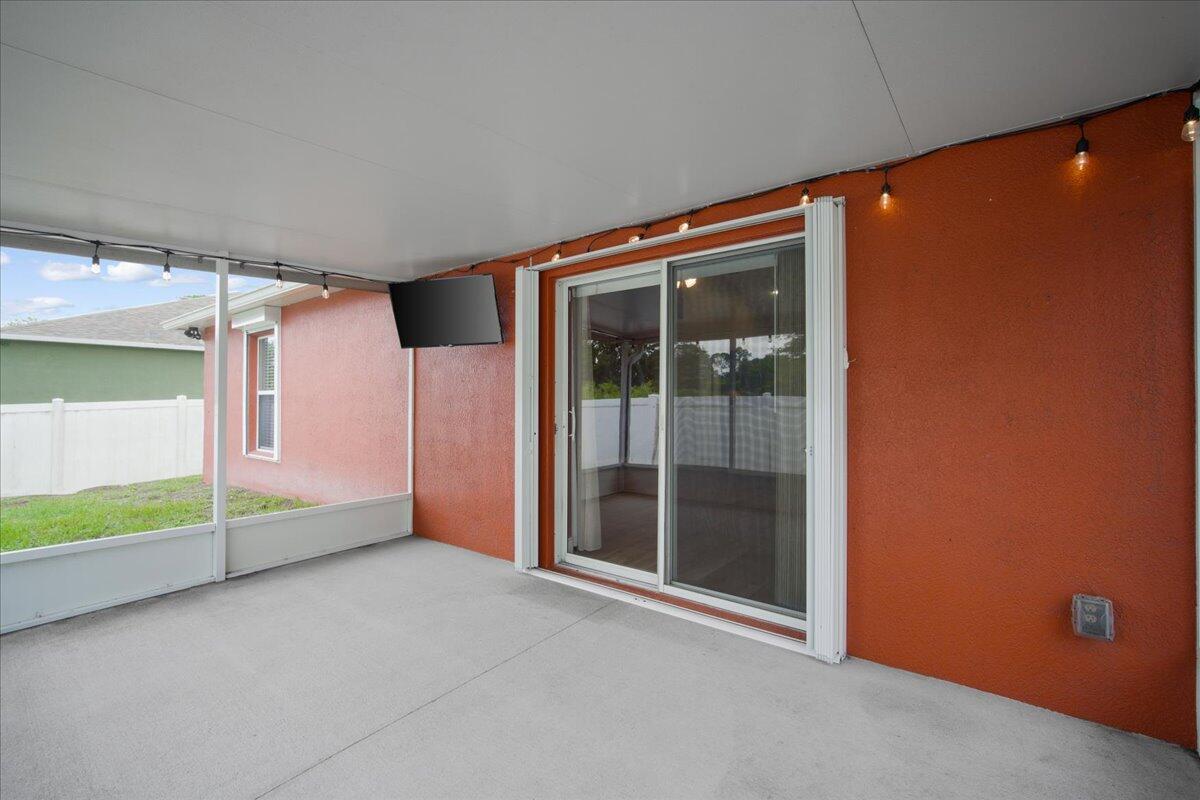 6445 Ainsworth Road Cocoa, FL 32927 - Photo 27 of 31 a view of an empty room with a window