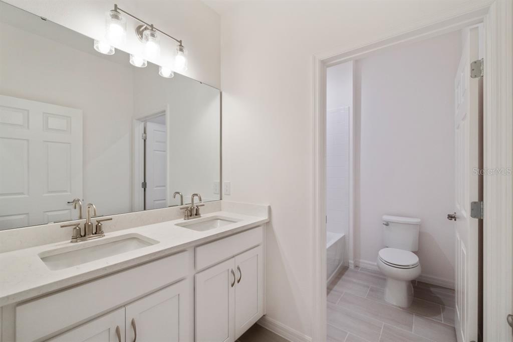 5942 Vision Road St. Cloud, FL 34771 - Photo 6 of 11 Hall Bath