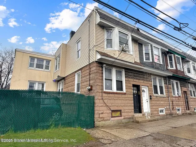 a view of a house with a garden
