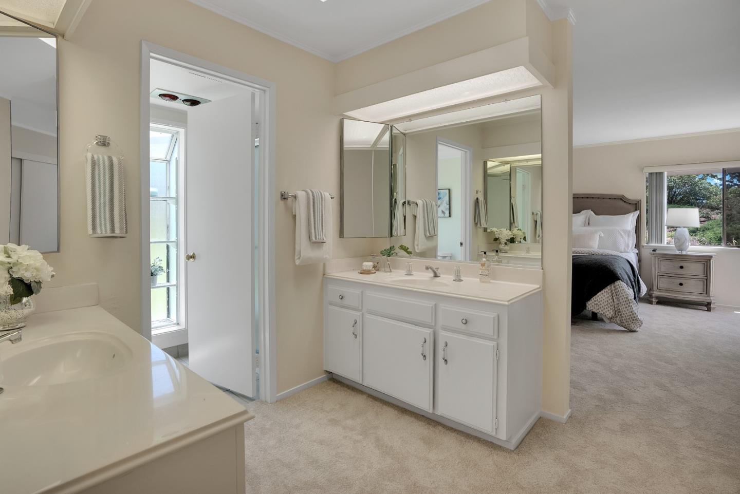 6294 Blauer Lane San Jose, CA 95135 - Photo 18 of 26 a spacious bathroom with a double vanity sink mirror and double