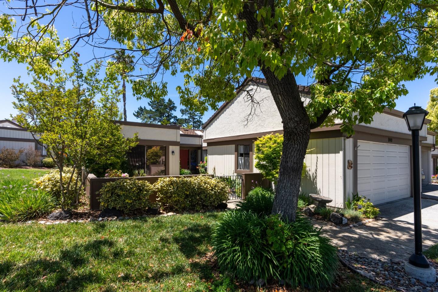 6294 Blauer Lane San Jose, CA 95135 - Photo 2 of 26 a front view of a house with a yard