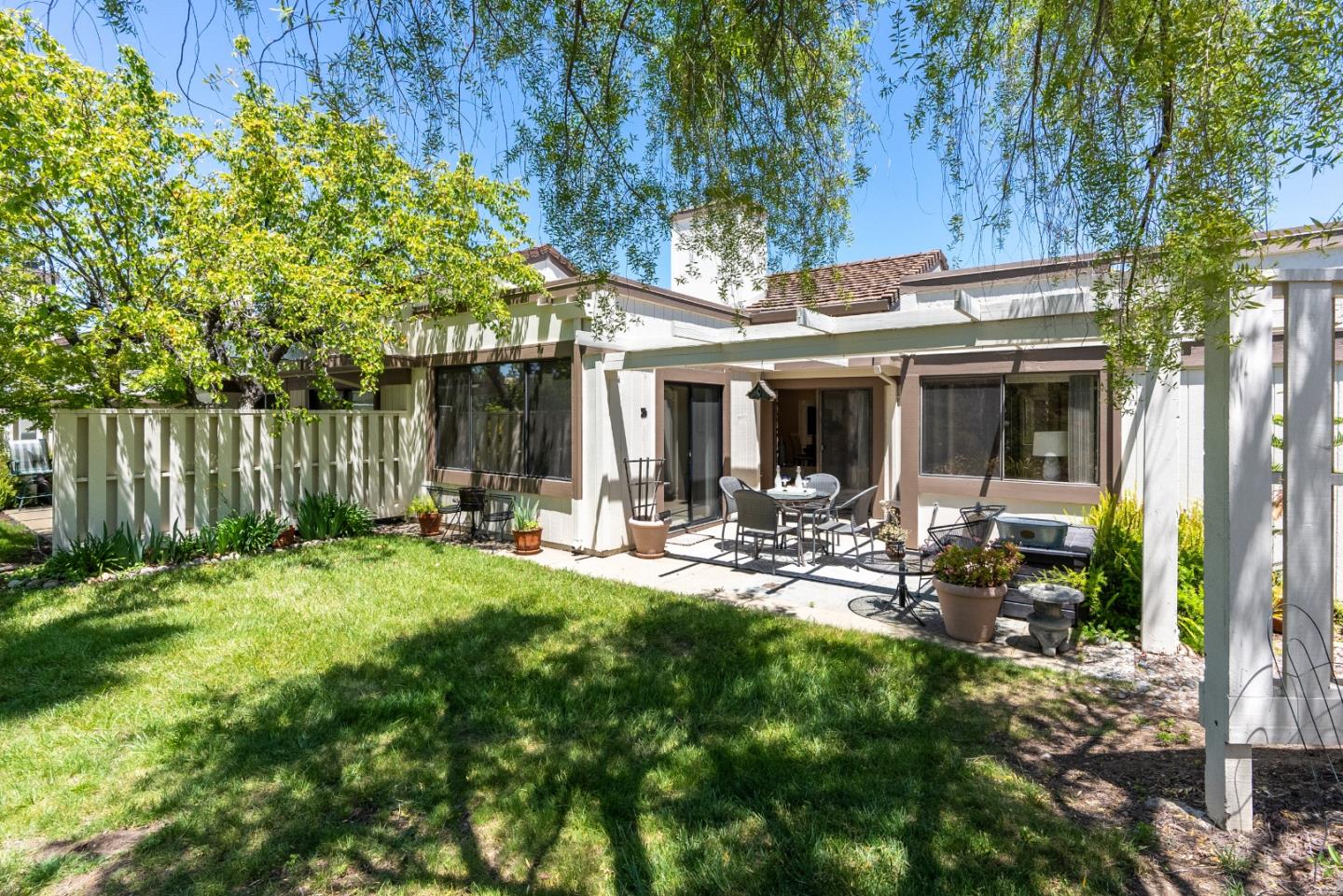 6294 Blauer Lane San Jose, CA 95135 - Photo 23 of 26 a view of a house with backyard and sitting area