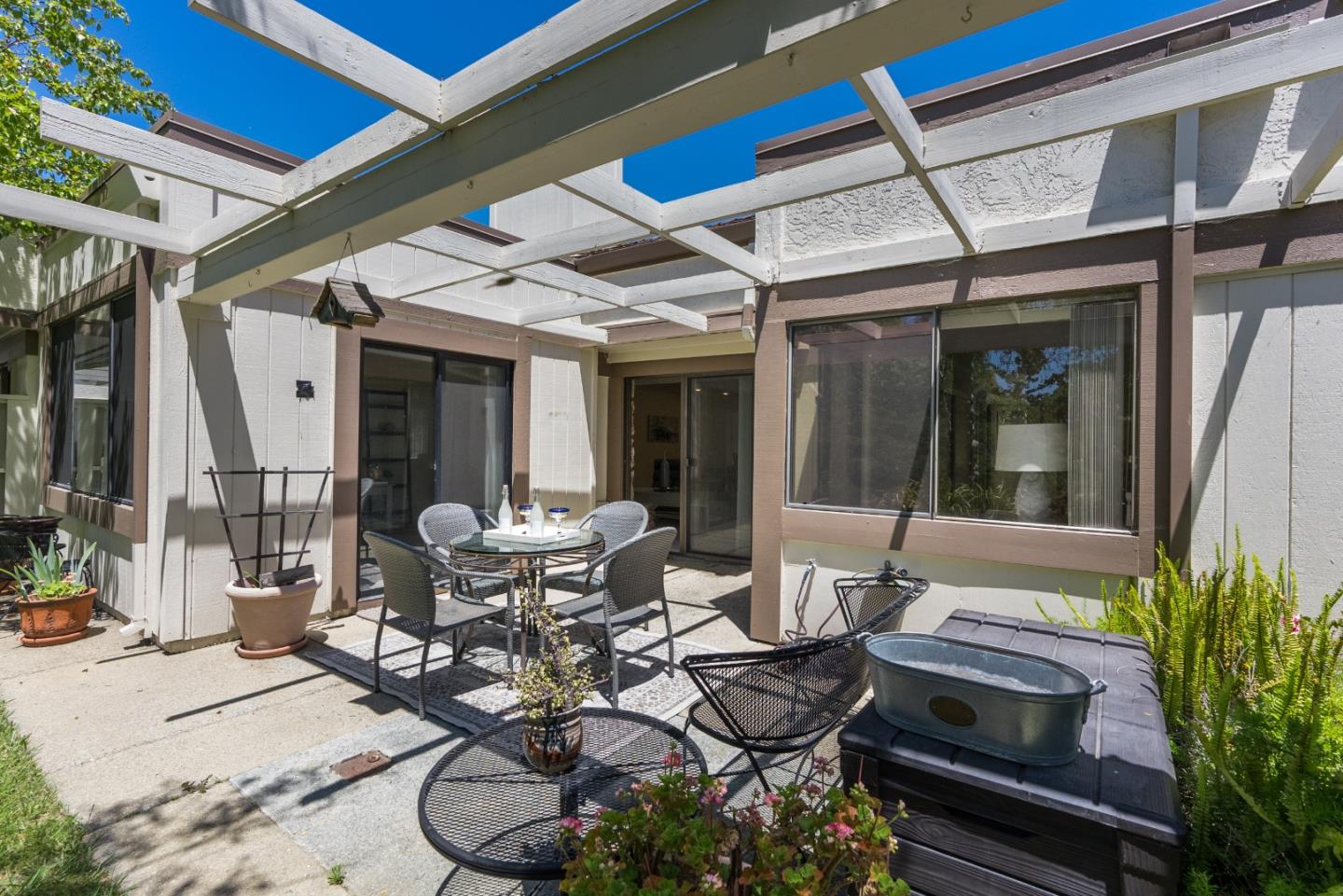 6294 Blauer Lane San Jose, CA 95135 - Photo 24 of 26 a outdoor space with lots of tables and glass windows