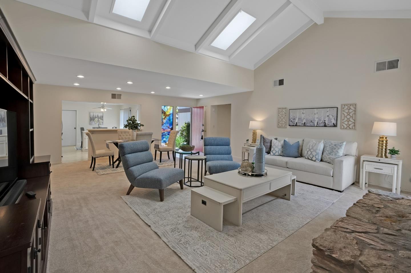 6294 Blauer Lane San Jose, CA 95135 - Photo 5 of 26 a living room with furniture and a flat screen tv