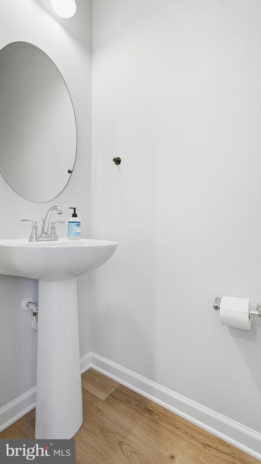 1790 Scenic Loop Culpeper, VA 22701 - Photo 16 of 33 a bathroom with a sink and a mirror