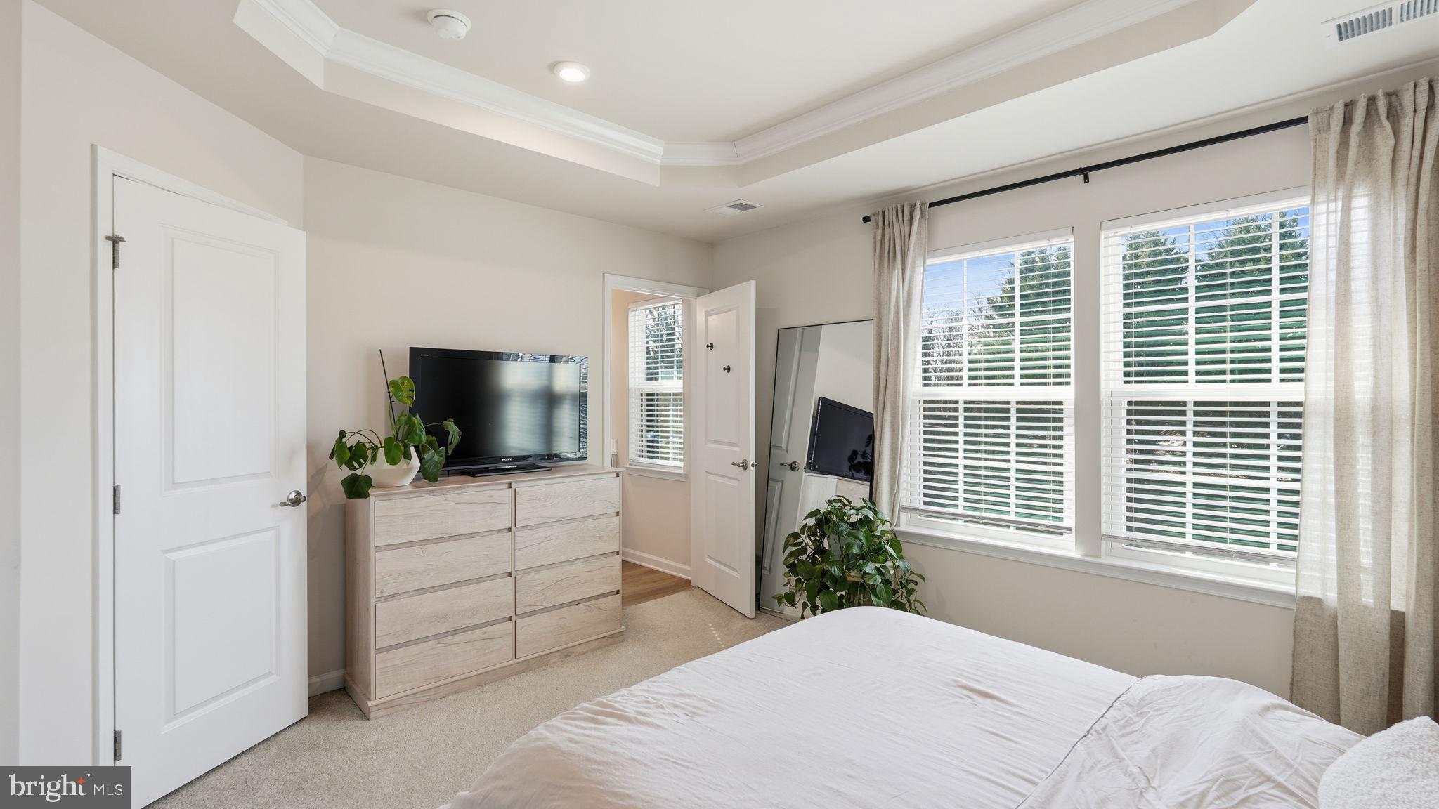 1790 Scenic Loop Culpeper, VA 22701 - Photo 17 of 33 a bedroom with a bed and a flat screen tv