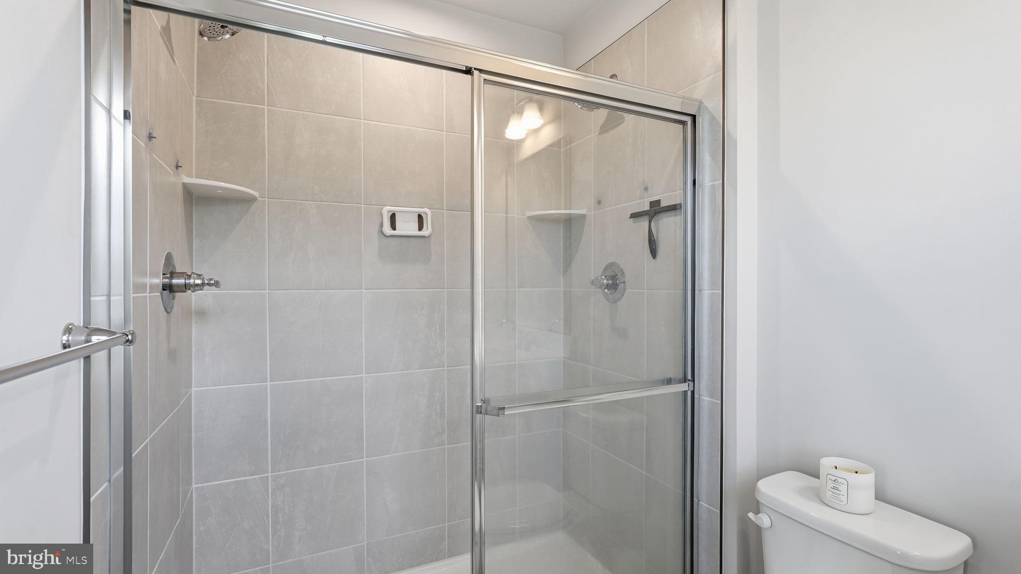 1790 Scenic Loop Culpeper, VA 22701 - Photo 19 of 33 a bathroom with a shower and toilet