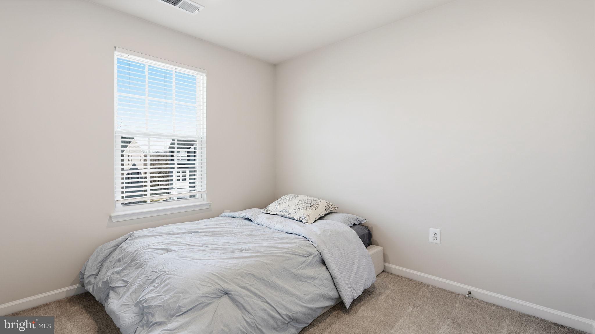 1790 Scenic Loop Culpeper, VA 22701 - Photo 21 of 33 a view of a bedroom with a bed
