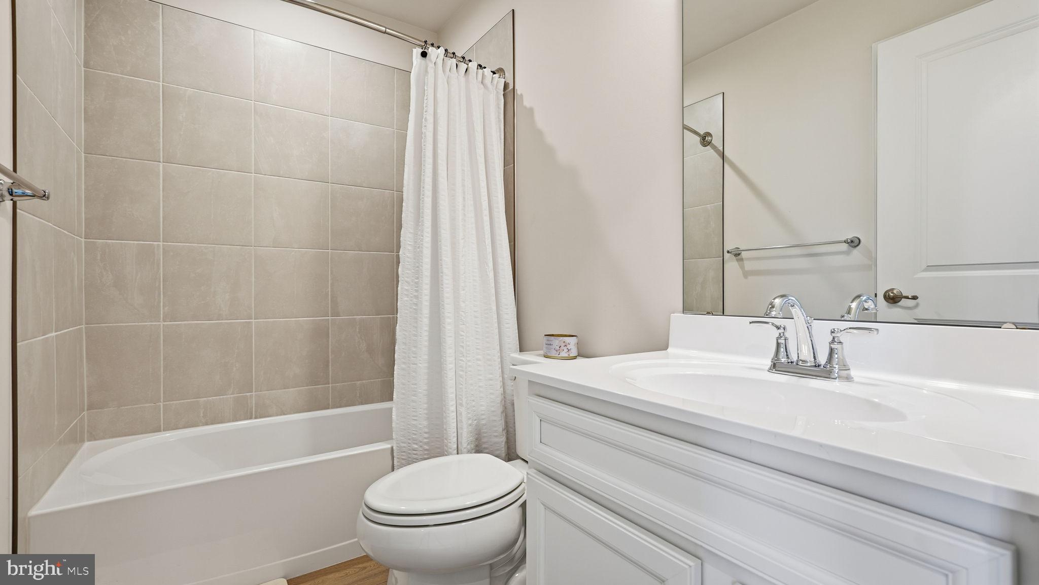 1790 Scenic Loop Culpeper, VA 22701 - Photo 23 of 33 a bathroom with a sink toilet and shower