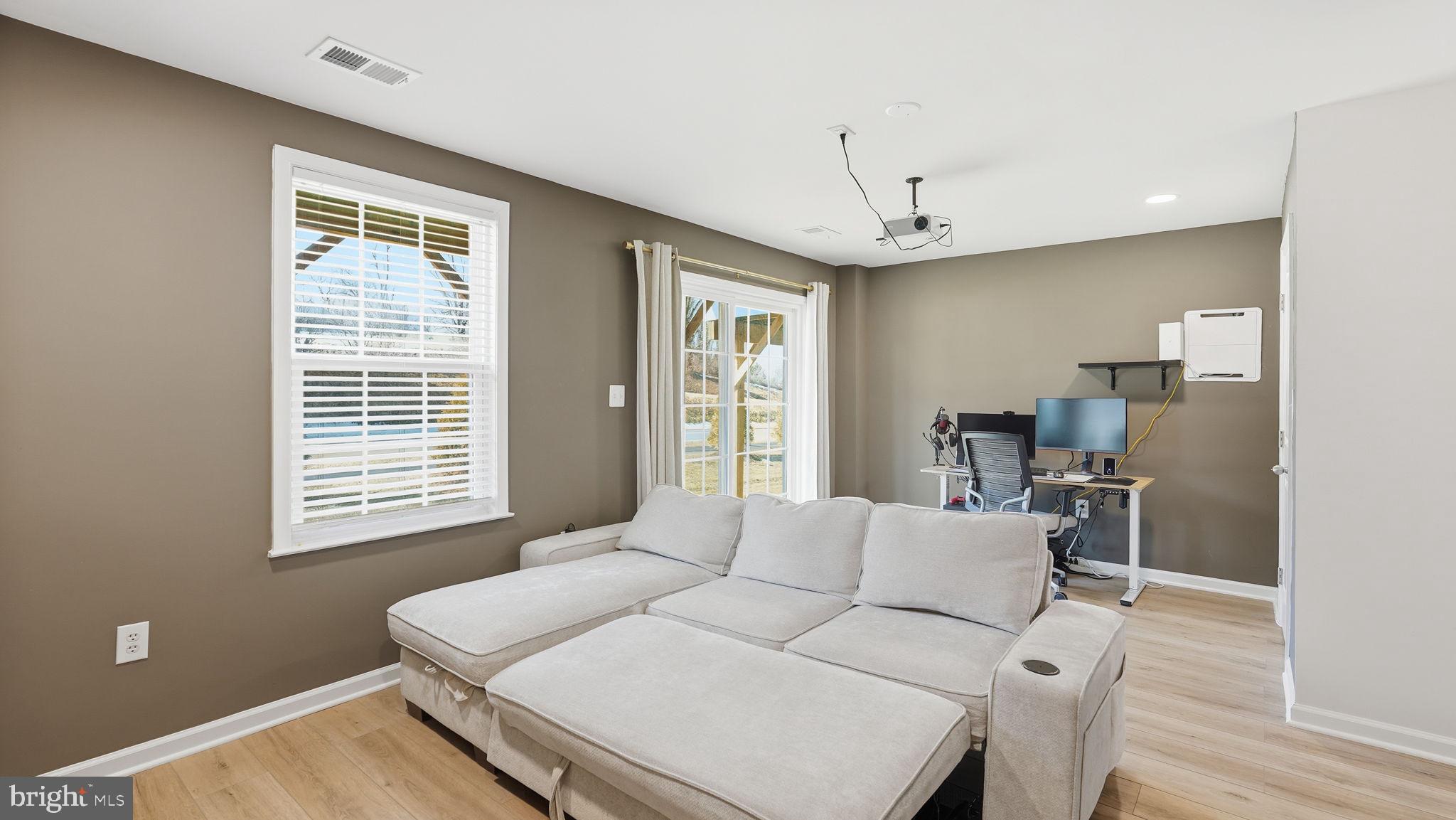 1790 Scenic Loop Culpeper, VA 22701 - Photo 26 of 33 a living room with furniture and a window