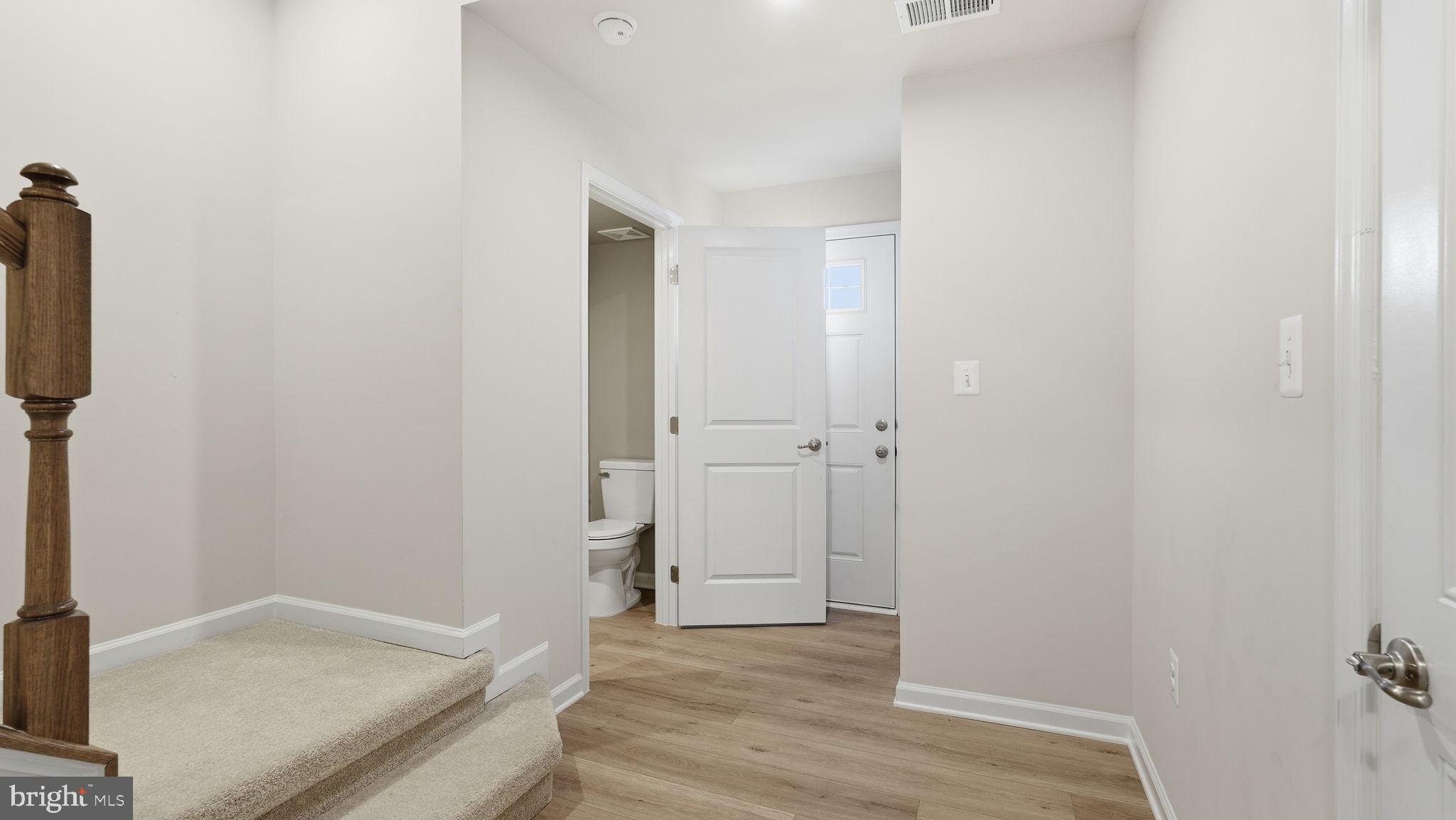 1790 Scenic Loop Culpeper, VA 22701 - Photo 30 of 33 an empty room with wooden floor and closet