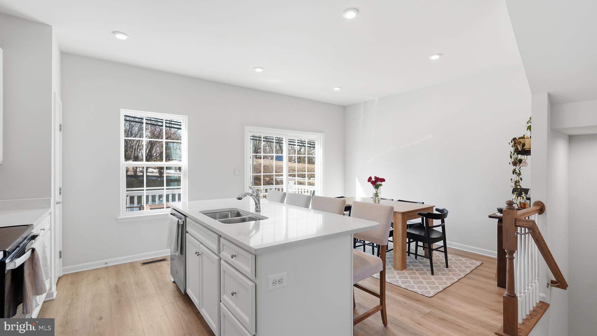 1790 Scenic Loop Culpeper, VA 22701 - Photo 4 of 33 a spacious kitchen with stainless steel appliances granite countertop a sink and a stove
