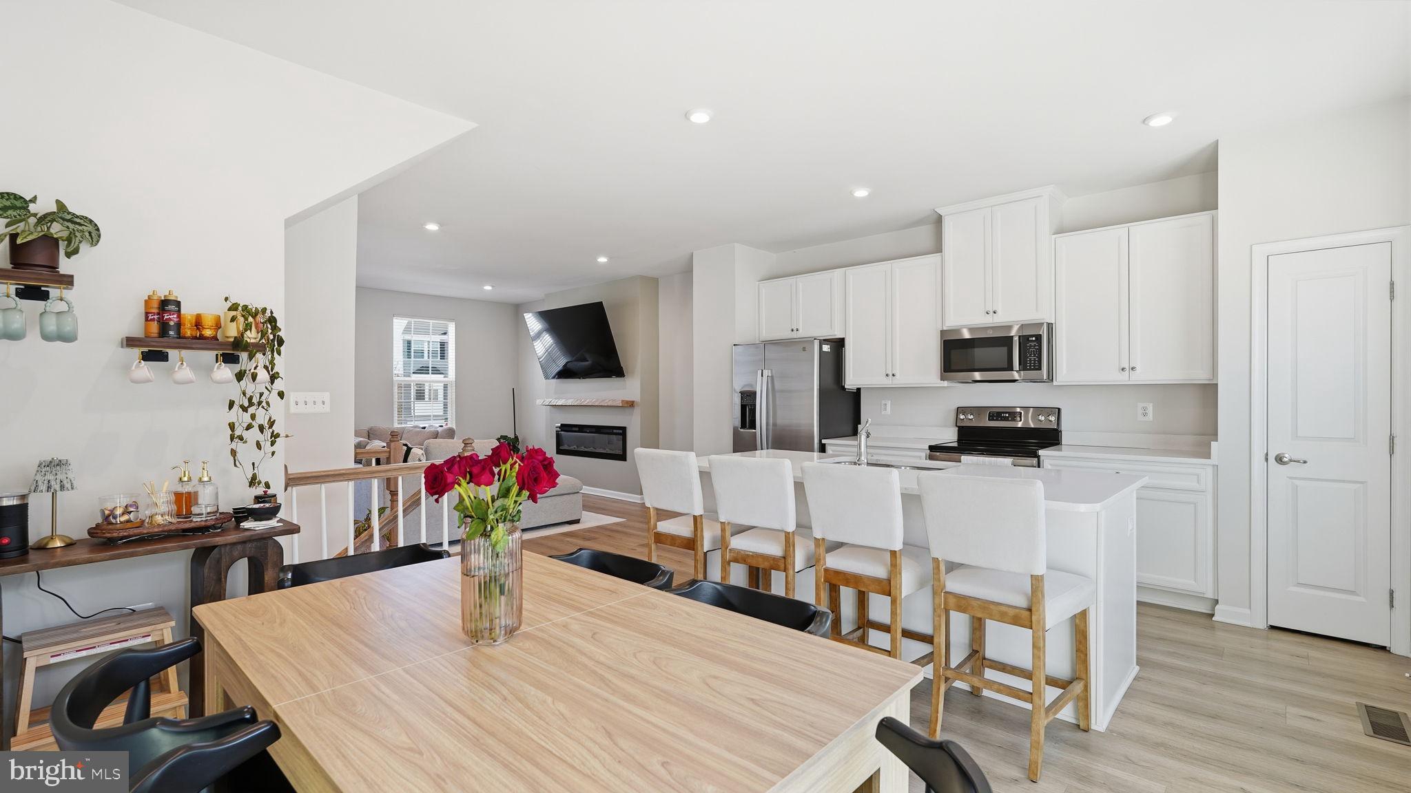 1790 Scenic Loop Culpeper, VA 22701 - Photo 6 of 33 a view of a dining room with furniture and wooden floor