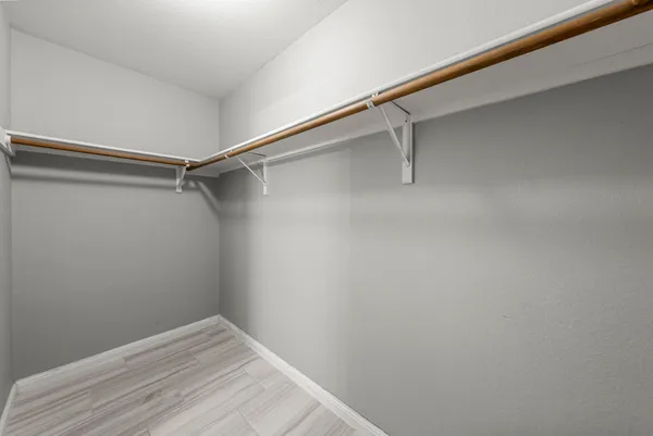 a view of a room with racks on the wall