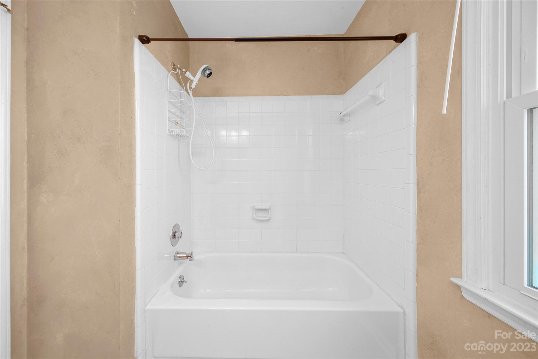 10700 Fairway Ridge Road Charlotte, NC 28277 - Photo 25 of 39 a bathroom with a bathtub and shower