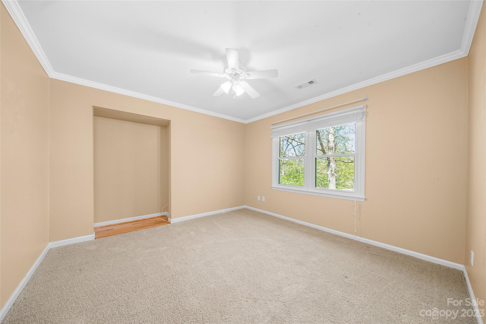 10700 Fairway Ridge Road Charlotte, NC 28277 - Photo 32 of 39 an empty room with windows and closet