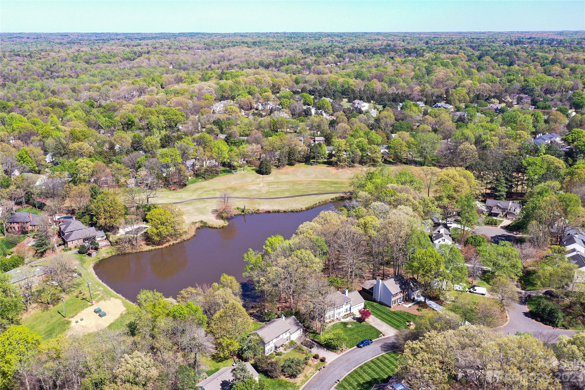 10700 Fairway Ridge Road Charlotte, NC 28277 - Photo 39 of 39 a view of a lake with a mountain in the background