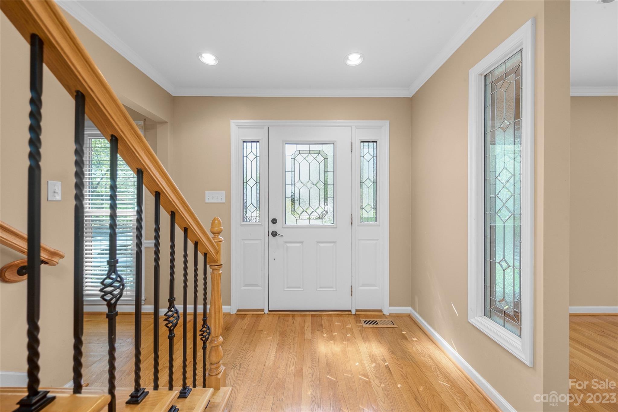 10700 Fairway Ridge Road Charlotte, NC 28277 - Photo 4 of 39 a view of an entryway with wooden floor and door