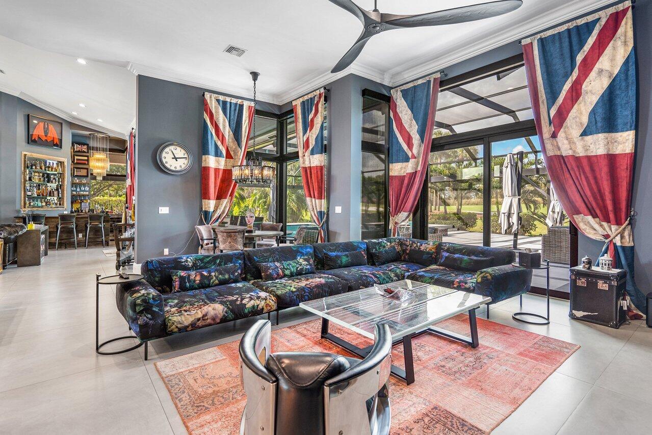 4848 Chamal Circle Boca Raton, FL 33487 - Photo 12 of 88 a living room filled with furniture and a large window