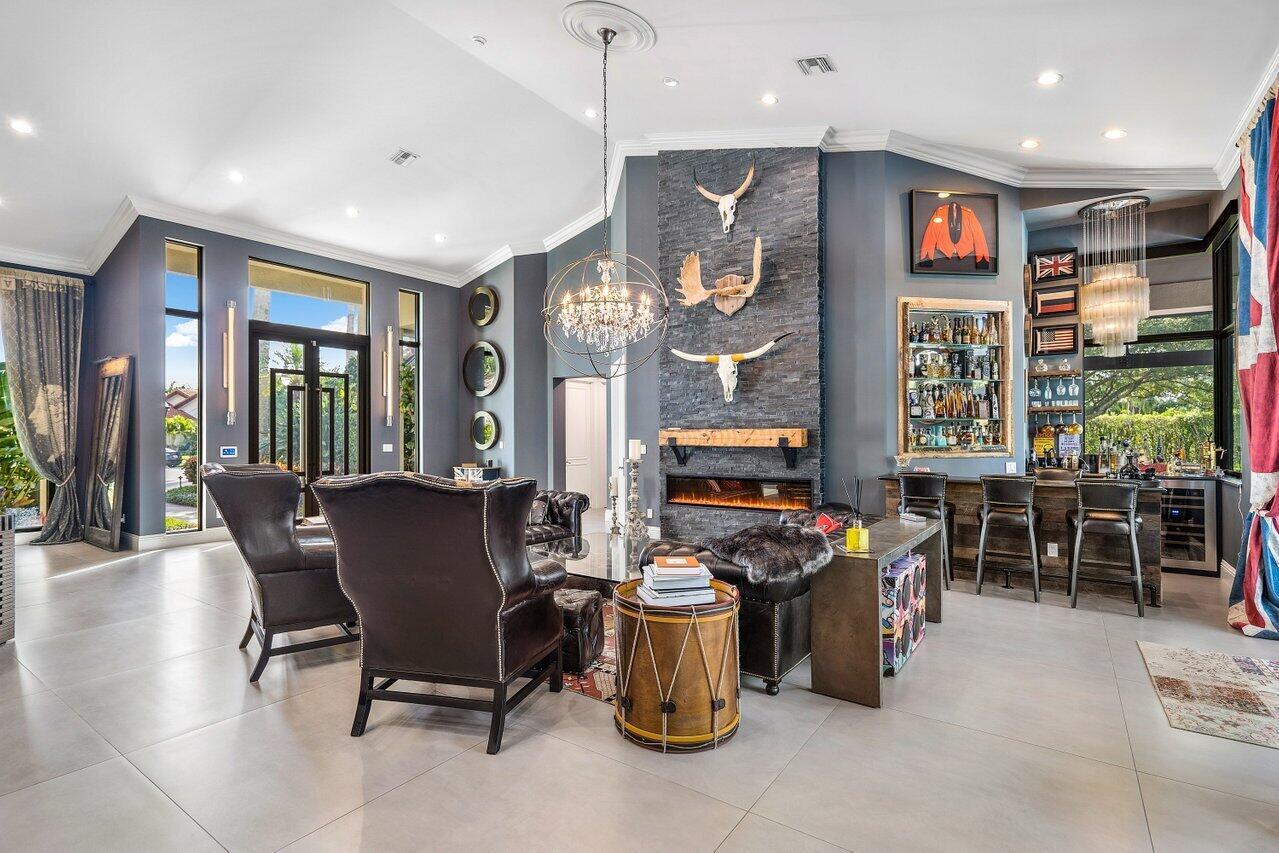 4848 Chamal Circle Boca Raton, FL 33487 - Photo 14 of 88 a view of a dining room with furniture window and outside view