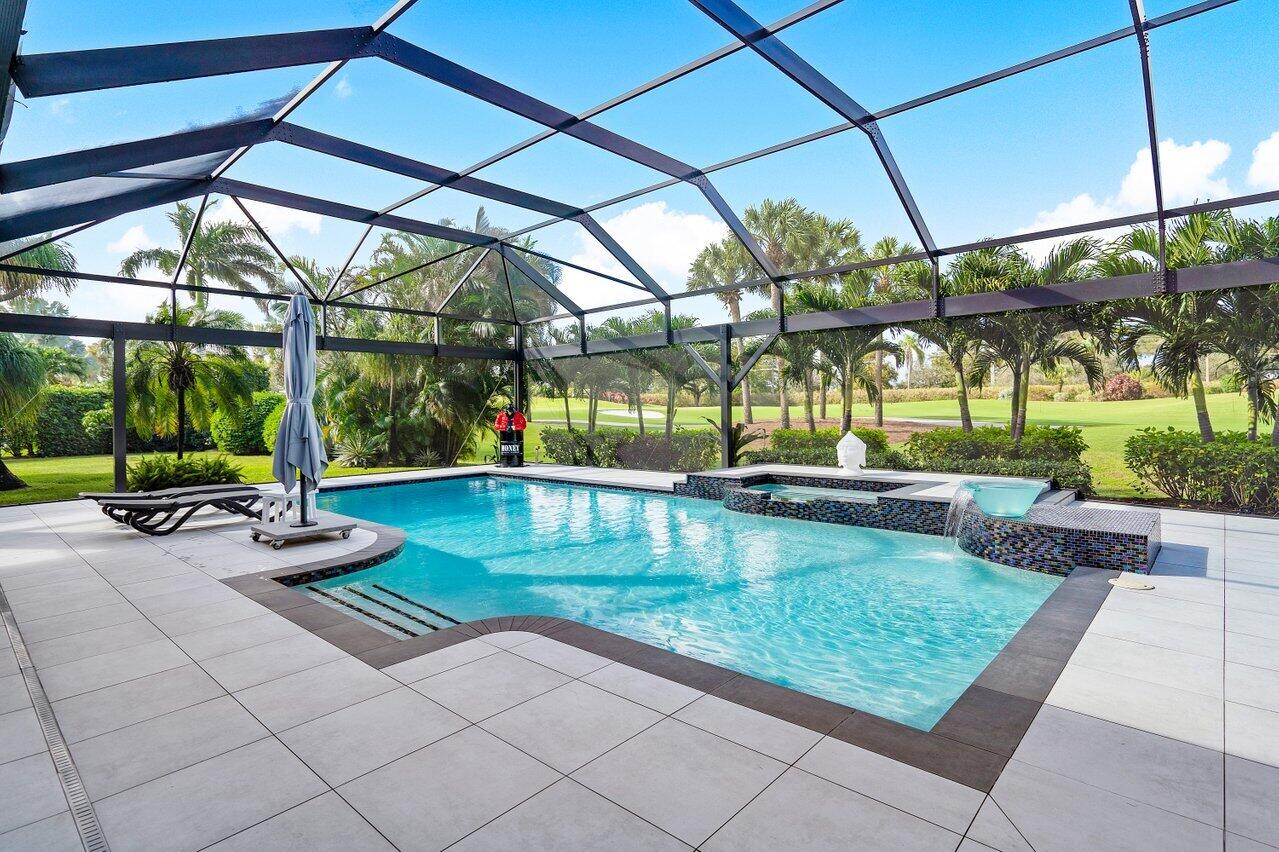 4848 Chamal Circle Boca Raton, FL 33487 - Photo 36 of 88 a view of swimming pool with outdoor seating