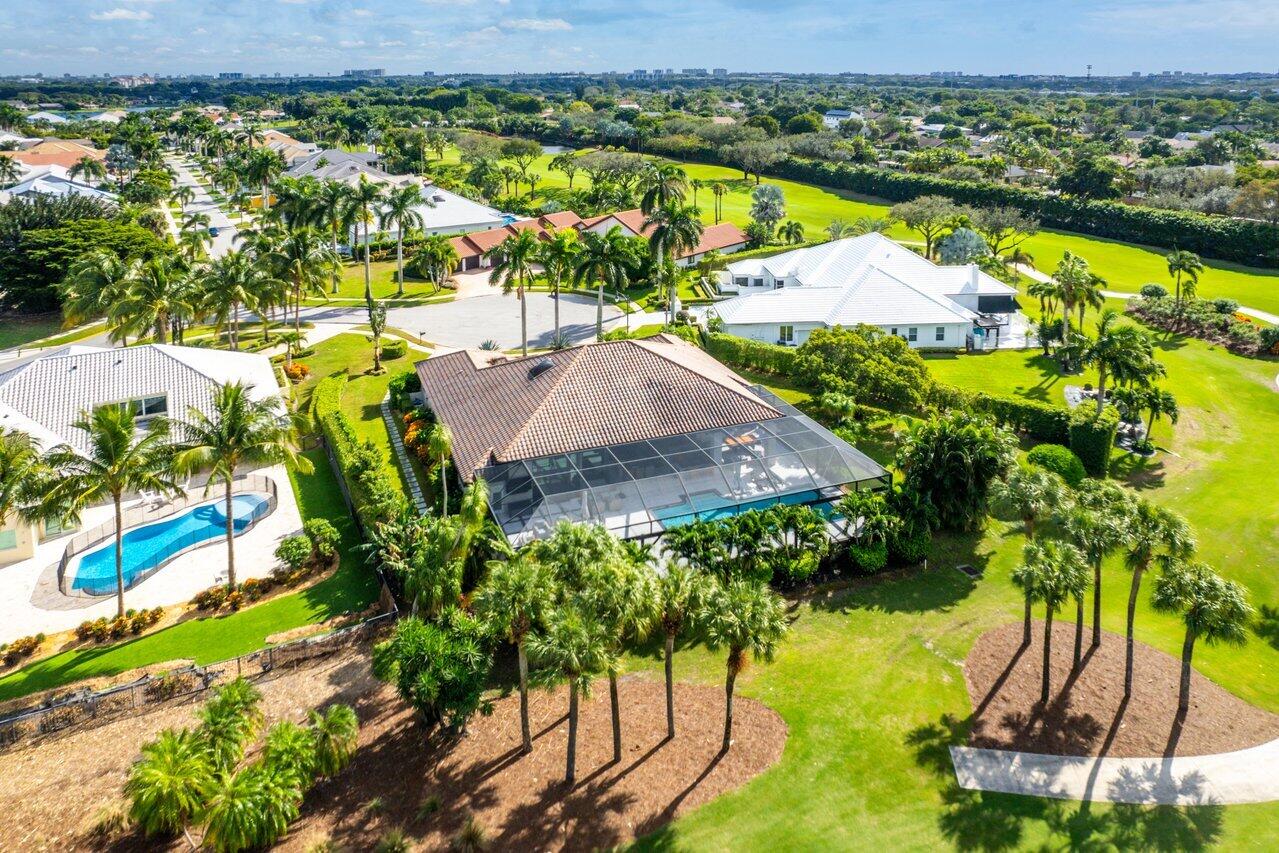 4848 Chamal Circle Boca Raton, FL 33487 - Photo 49 of 88 an aerial view of residential houses with outdoor space and swimming pool