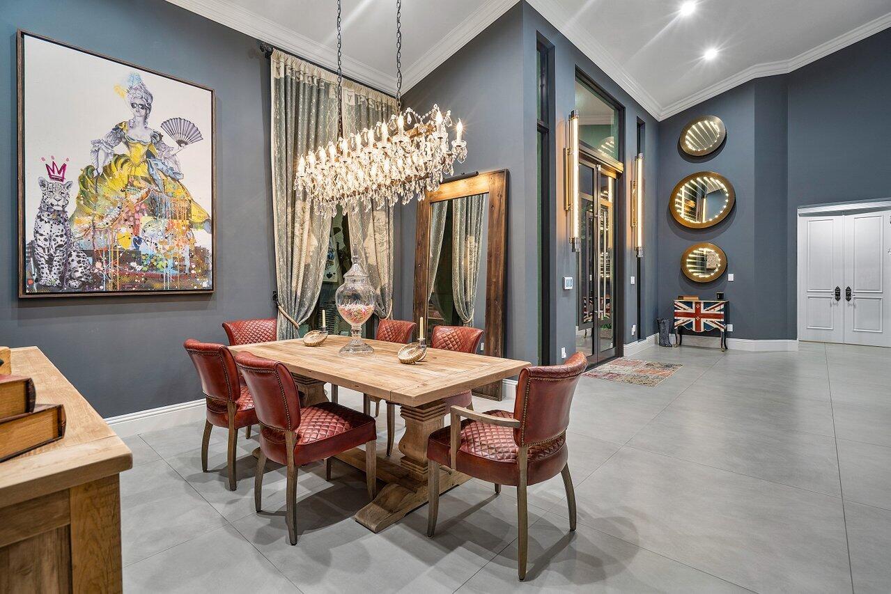 4848 Chamal Circle Boca Raton, FL 33487 - Photo 66 of 88 a view of a dining room with furniture window and outside view