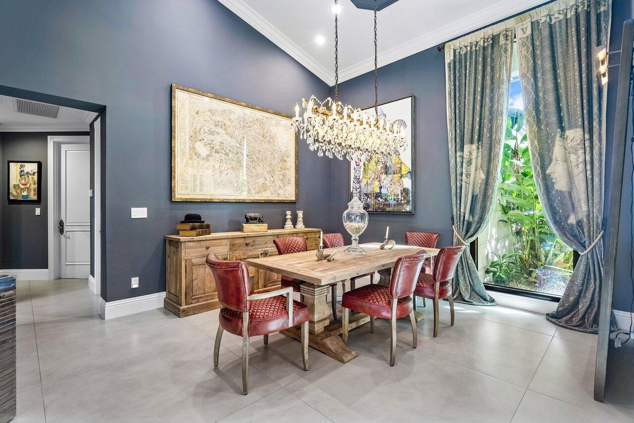 4848 Chamal Circle Boca Raton, FL 33487 - Photo 9 of 88 a view of a dining room with furniture window and outside view