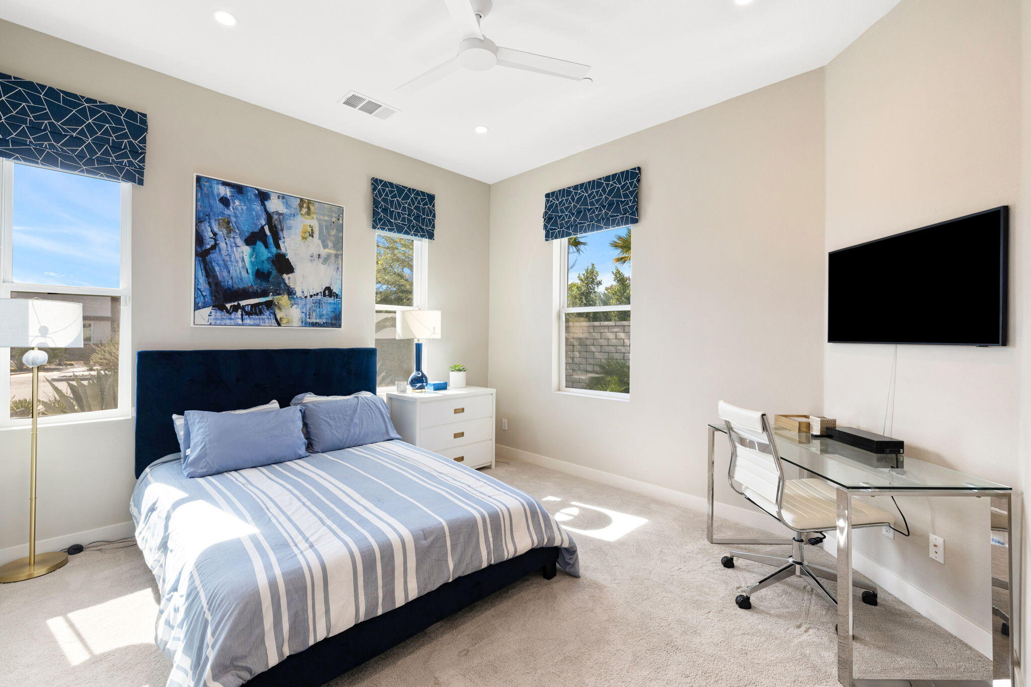 2 Iridium Way Rancho Mirage, CA 92270 - Photo 11 of 67 a bedroom with a bed and a flat screen tv