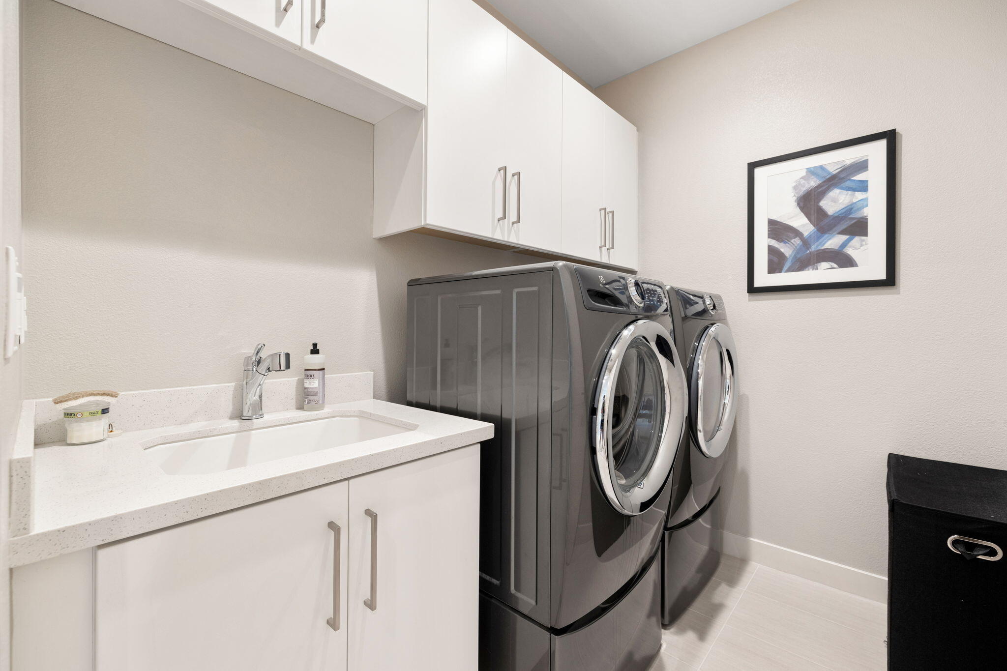2 Iridium Way Rancho Mirage, CA 92270 - Photo 17 of 67 a utility room with dryer and washer